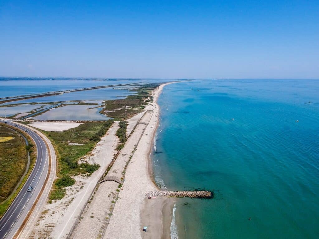 An aerial view of a beach and ocean.